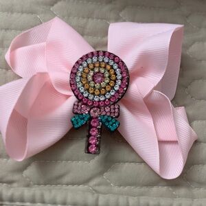 Pink Bow Hair Clip with Gemstone Lollipop Design
